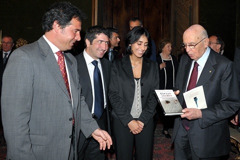 Il Presidente Giorgio Napolitano riceve il volume "Divise Forate" nel corso della cerimonia del Giorno della Memoria dedicato alle vittime del Terrorismo | Palazzo del Quirinale 09/05/2011