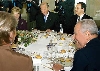 Il Presidente Ciampi con la moglie Franca ed il Sottosegretario agli Affari Esteri Mario Baccini, durante la colazione offerta dalle LL.MM. il Re Alberto II e la Regina Paola del Belgio al Castello di Laeken.